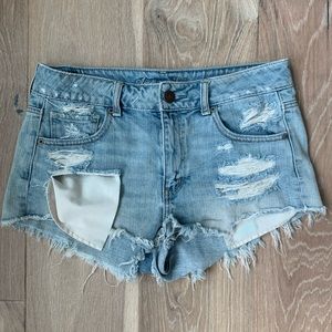 Destroyed denim shorts